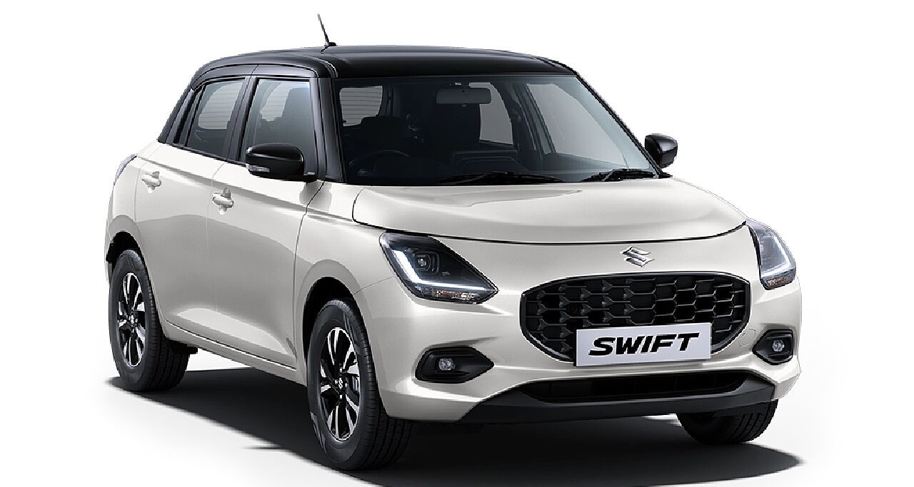 Drive your Pearl Artic white with Midnight Black Roof Maruti SWIFT home from Indus Motors 